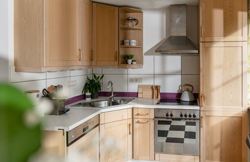 Bruck an der Grossglocknerstrasse Apartamento | Amplio apartamento con jardín privado y vistas a la montaña, con capacidad para 8 personas.