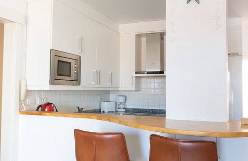 Poris de Abona Apartamento | A nivel del mar, y con vistas la playa. Apartamento con terraza y 8 hrs de sol