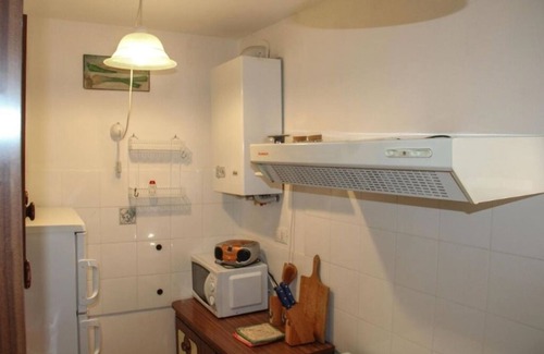 Roccascalegna Casa | At the Oven Door