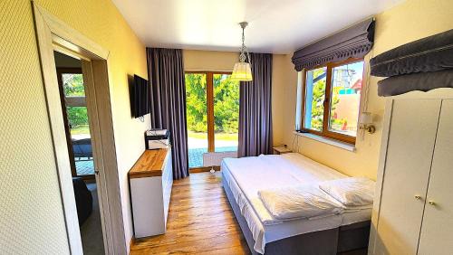 Sendvario seniunija Apartamento | Atostogų būstas su jacuzzi
