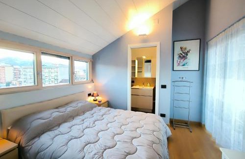 Intra Apartamento | Attico Don Minzoni