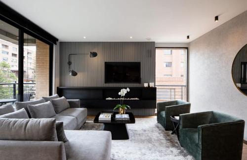 Chico Reservado Apartamento | Attik Luxury Apts