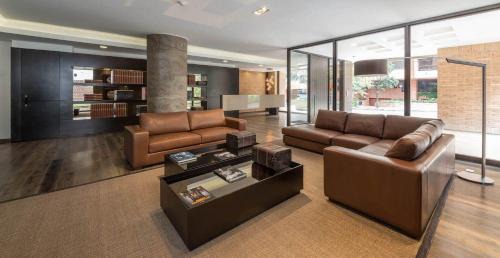 Chico Reservado Apartamento | Attik Luxury Apts