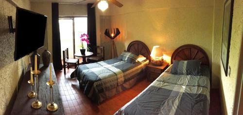 Zona Expo Hotel | Aurora Suites