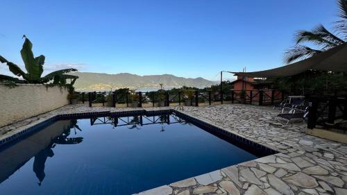 Itaquanduba Casa | Residencial Azul Marinho - Suites de temporada