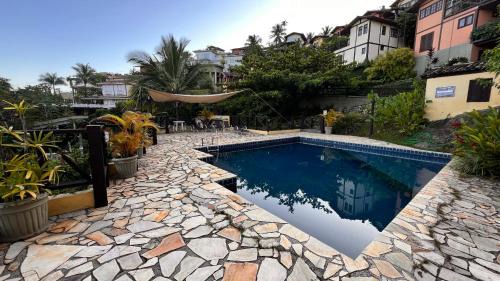 Itaquanduba Casa | Residencial Azul Marinho - Suites de temporada