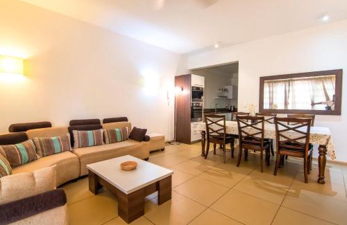 Roches Noires Casa | Azuri Ocean Village - Elegant 3-Bedroom Apartment with Private Garden, Beach & Pool Access in Roches Noires