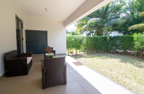Roches Noires Casa | Azuri Ocean Village - Elegant 3-Bedroom Apartment with Private Garden, Beach & Pool Access in Roches Noires