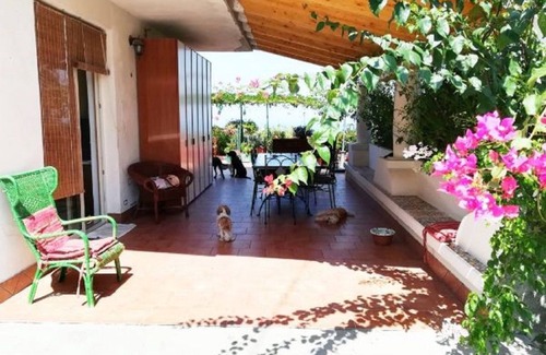 Condro Apartamento | B & B L'Olivo - ático en una villa con vistas al mar y las islas Eolias con terraza y jardín