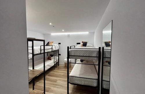 Andújar Apartamento | BAJO A habitación con literas Apartamentos JUAN ROBLEDO Centro Ciudad