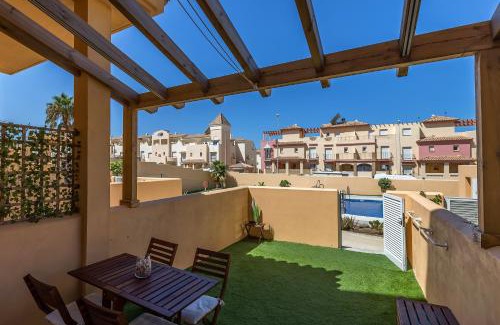 Tarifa Apartamento | Bajo con Jardin y Piscina cerca de la Playa Dos Dormitorios