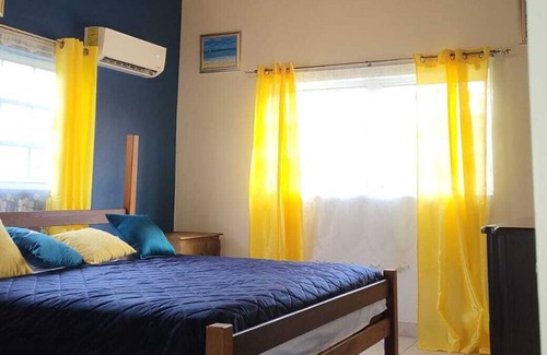 Great Exuma Casa | Balmain Vista is a 2 bedroom , 2 bathroom living room space and 1 kitchen area.