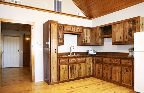 Big Creek Casa | Barn Loft Apt 2 with Lake & Mountain views & custom wood accents through out.