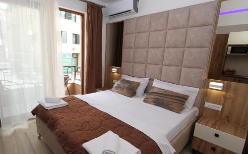 Maini Apartamento | Baron