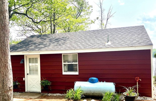 Traverse City Cabaña | Bass lake waterfront! Cozy 1 bedroom cottage minutes from Traverse City!