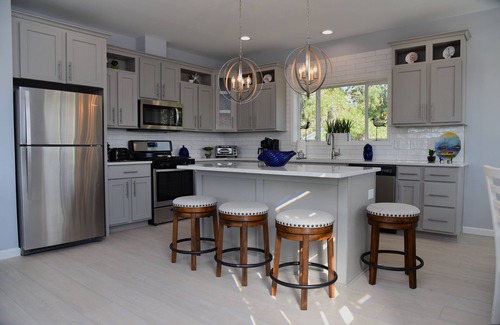 Long Neck Casa | Bay front retreat - beach, pools, pet friendly!