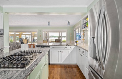 Reedville Casa | Bayfront Oasis with Heated Pool, Hot Tub & Playground! Family & Pet friendly!