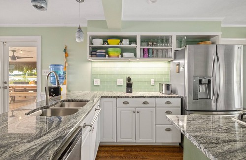 Reedville Casa | Bayfront Oasis with Heated Pool, Hot Tub & Playground! Family & Pet friendly!