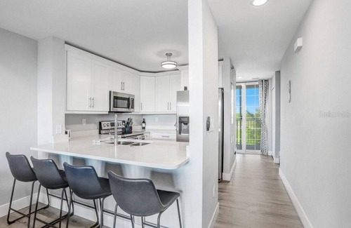 Ruskin Casa | Bayfront Townhouse w/Heated Pool, HotTub, Beach, Marina, tiki bars w/live music