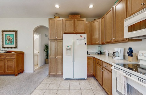Sun Ridge Casa | Bayside Resort townhouse w/ balcony, free WiFi, pool, and golf on-site