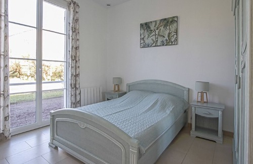 Sainte-Honorine-des-Pertes Casa | Hermosa casa de vacaciones en Aure sur Mer con jardín