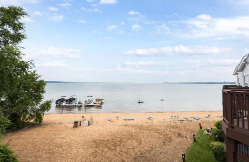 Traverse City Casa | Beach 321 with Vaulted Ceilings Pool Hot Tub and Stunning Views from Private Deck