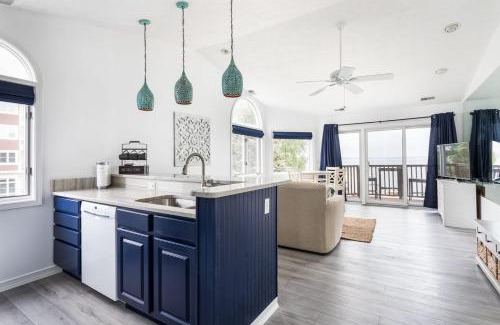 Traverse City Casa | Beach 321 with Vaulted Ceilings Pool Hot Tub and Stunning Views from Private Deck