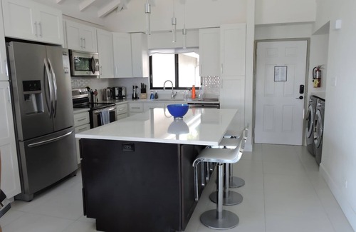 Seven Mile Beach Condominio | Condominio de playa con vista al atardecer