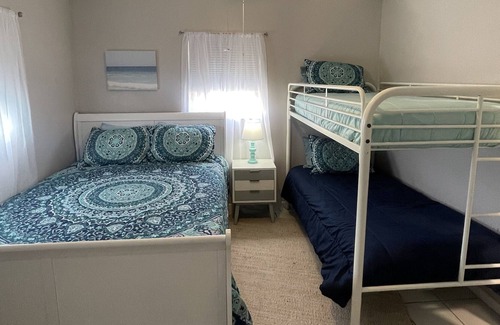 Crescent Beach Cabaña | Beach cottage walking distance to the sugary white sand!
