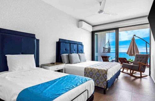 Flamingos Apartamento | ~Beach Front~Stunning VIEWS~Free Airport Transport