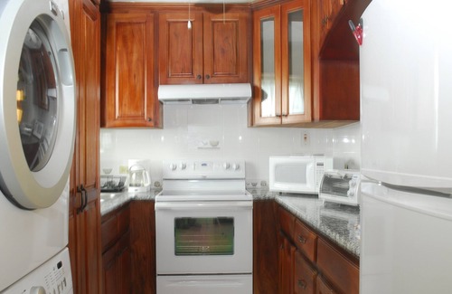 Orange Bay Casa | Frente a la playa, bien equipado, adosado (ideal para familias)