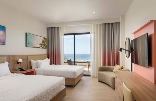 La Romana Hotel | Escape to Comfort – Serene Getaway w/Pool, Balcony | Steps from Caleta Beach