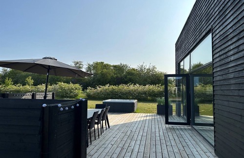 Saksild Strand Villa | Beach house with hot tub near Aarhus, Denmark