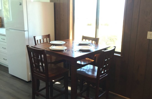 Clinton Cabaña | Beach house with views of Puget Sound, ferry, North Cascades, Mt Baker, Rainier.