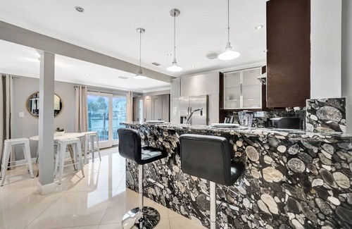 Hendricks and Venice Isles Apartamento | Beach Isles: Modern 1BR Waterfront Apartment with Patio