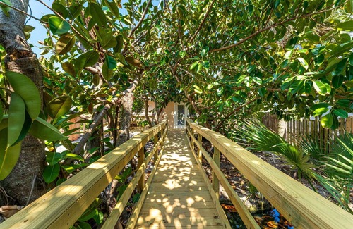 Tropic Casa | Beach Paradise. Spacious, rustic, charming, original Florida style beach house.
