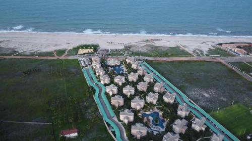 Loteamento Parque das Fontes Apartamento | Beach Place Resort Bangalo 12
