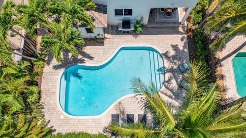 Birch Park Finger Streets Casa | BEACH TIME Steps to beach with Heated Pool and Game RoomSun Key RESlDENCES