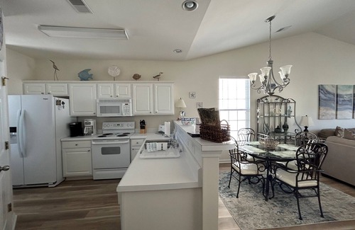 Sunset Beach Condominio | Beach Times & Tee Times!