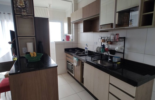 Praia Grande Apartamento | Beachfront condominium, 1-bedroom apartment with views of the mountains and sunset