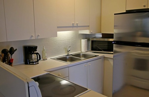 Seven Mile Beach Condominio | Frente a la Playa 1 Br Condo en Playa de Siete Millas A # 20 Cayman Reef Resort