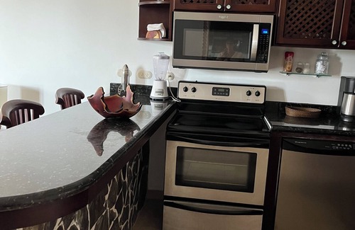 Barrio Los Villalobos Condominio | Beachfront condo with rooftop patio and amazing views in the heart of Jaco .