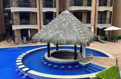 Barrio Los Villalobos Condominio | Beachfront condo with rooftop patio and amazing views in the heart of Jaco .