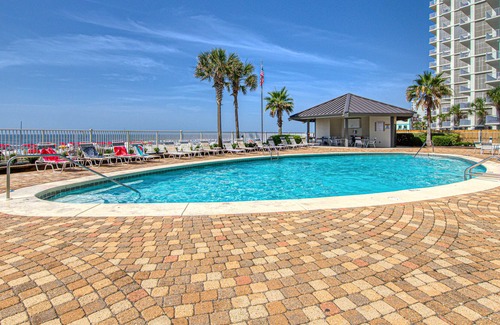 Orange Beach Condominio | Beachfront corner condo with pools, a hot tub, tennis, & sauna