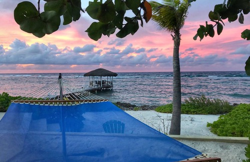 North Side Casa | WINDSONG - Frente a la playa con muelle privado y piscina de 50 pies