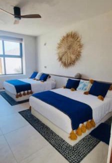 Ixtapa - Zihuatanejo Casa | Beachfront White Villa in Playa Blanca