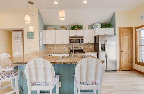 Buck Island Casa | Beachin Fun (North Unit) | 1665 ft to the beach | Hot Tub, Dog Friendly, and Community Pool