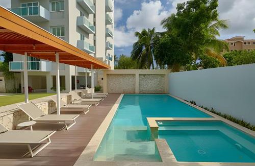 Juan Dolio - El Pueblo Apartamento | Beachside 1Bdrm Apt. Hidden Oasis with Pool & BBQ