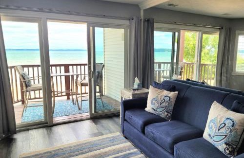 Traverse City Casa | Beachside 213 with Pool Hot Tub and Private Deck overlooking East Bay