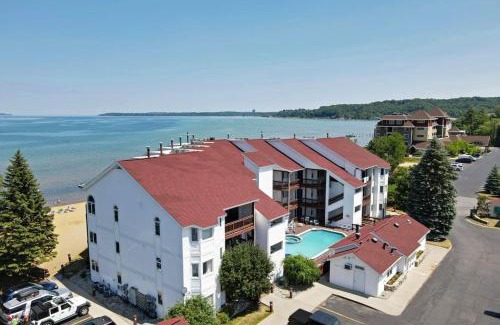 Traverse City Casa | Beachside 213 with Pool Hot Tub and Private Deck overlooking East Bay